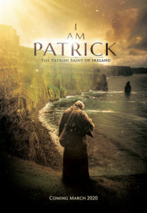 I Am Patrick cover art shows an image of a hooded Patrick overlooking a beautiful Irish seascape.